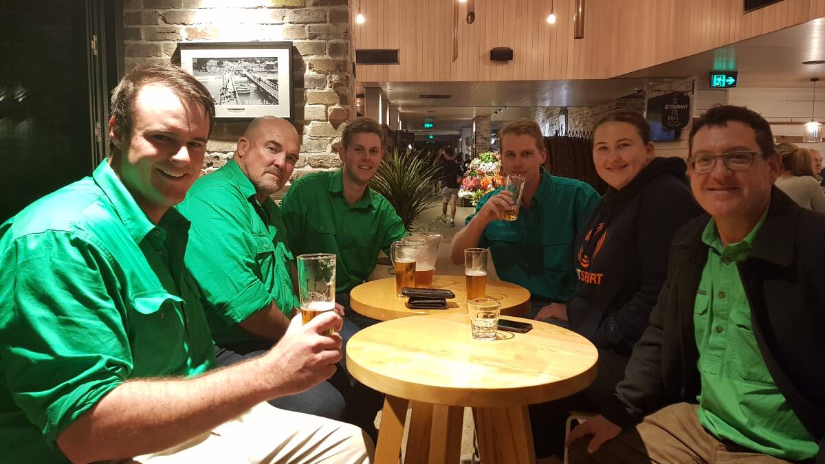 Green Shirts instigator, Martin Bella, second right, with Callum Scott, Bryson Head, Tom Pumpa, Olivia Wood, and Andrew Freeman, having a debrief at the end of polling day in Longman. Photo supplied.