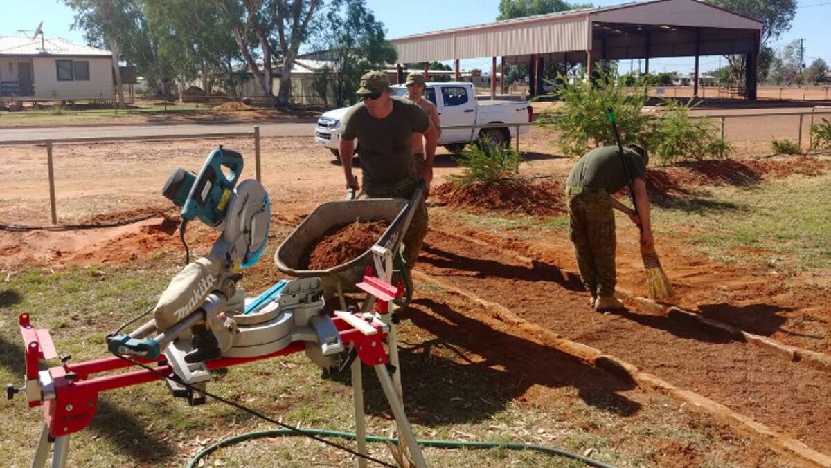 Australian Army soldiers assisting with renovations of the Catholic Church in Windorah.
