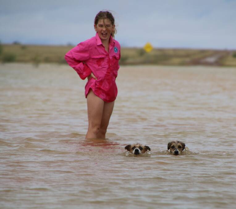 Dog paddle: Winton's Simone Sorensen and her Jack Russells enjoyed a dip. Picture: Alex Sorensen.