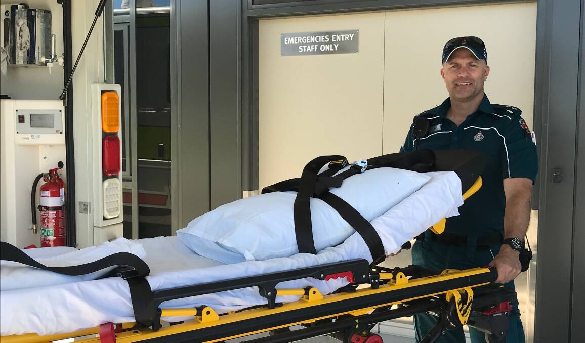Aramac resident and Queensland Ambulance Service paramedic, Dan Hovey, at the ambulance entry to the new Aramac Primary Health Centre.