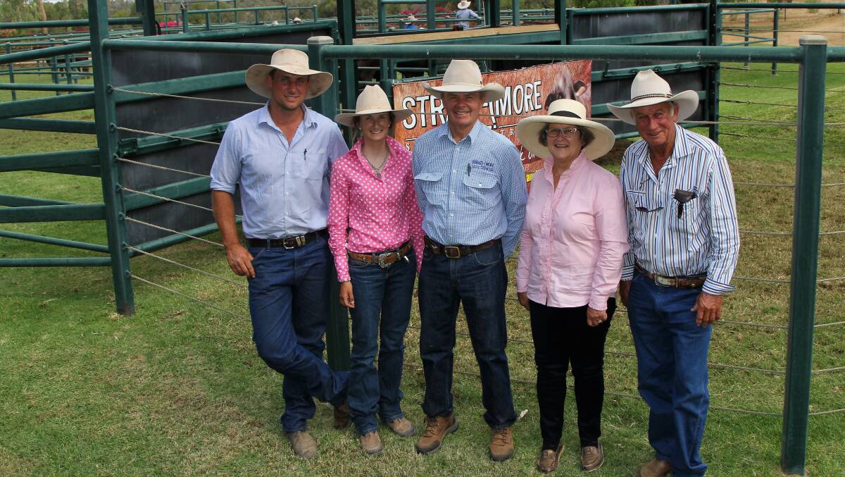 Strathmore principal Ian Walker, centre, with sale volume buyers Bob and Andrea Speed, Retreat, Yaraka, and Trish and Eddie Dennis, Mistake Creek, Clermont.