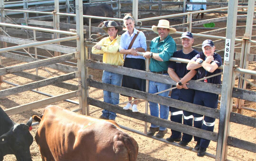 Checking out the results of the sale were AJ Riley, Ray White Roma, Katrina Marsh, team lead for Santos's Roma region, John Groves, Fraser's Transport Roma, and LifeFlight crew.