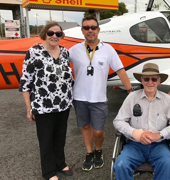Pilot Morne Terblanche, centre, pictured with Lindsay and Nigel MacDonald, Blackall, preparing for an Angel Flight trip to Toowoomba. The couple are among thousands worrying they'll be left stranded if the latest changes proposed by CASA are brought in.