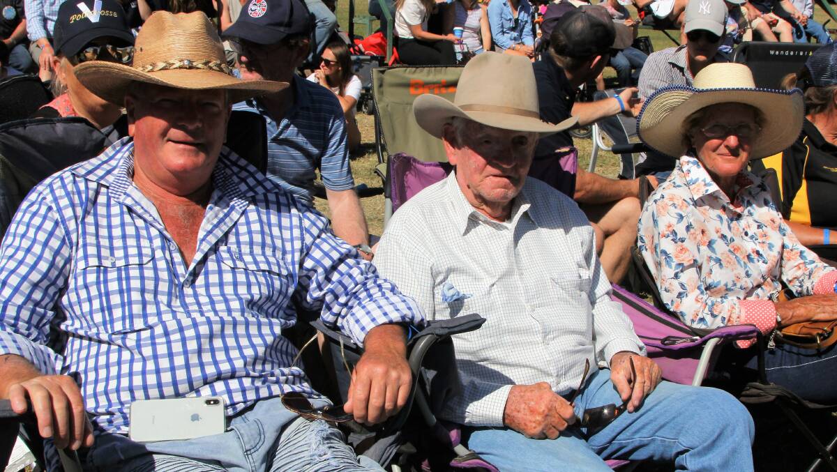 Jim Ramage, centre, Australia's oldest competitive polocrosse player, settles in for some sideline action at the World Cup with Peter Ridgway, Gippsland, Victoria, and Queensland's oldest female player, Brenda Taylor, Arcadia Valley.