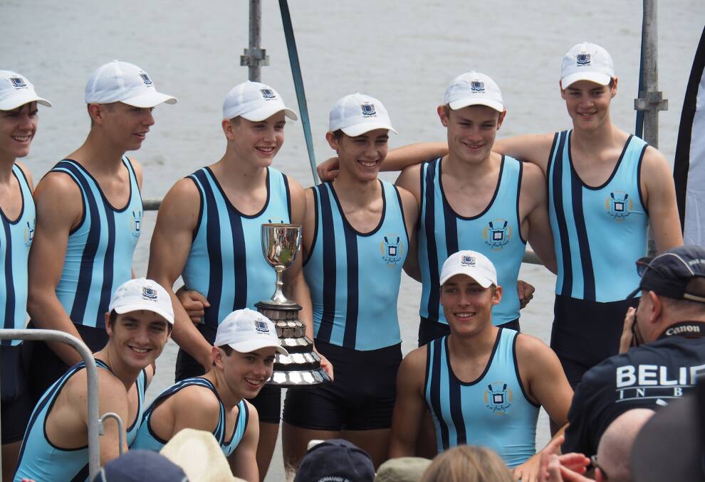 The jubilant Brisbane Grammar School first VIII proudly display the O'Connor Cup for their 2020 Brisbane GPS Head of the River open win. Photo supplied.