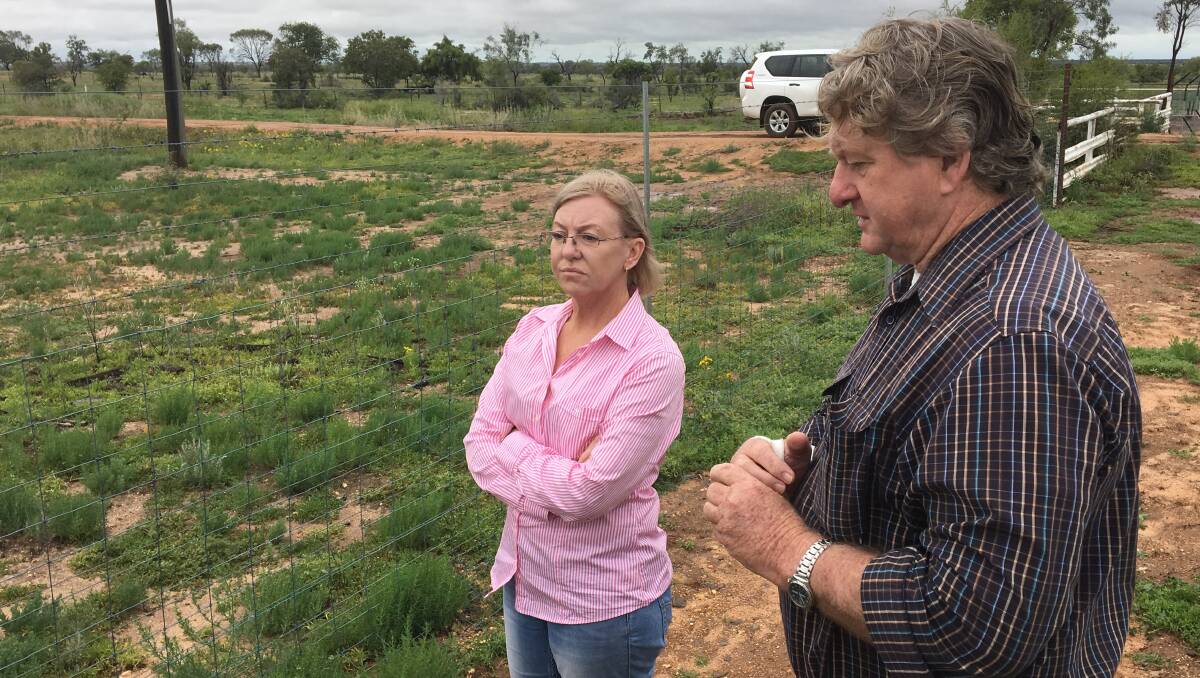 Agriculture Minister Leanne Donaldson, pictured here at Longreach with wild dog fence commissioner Vaughan Johnson, recently announced that work had started on a cluster fencing project at Talwood.