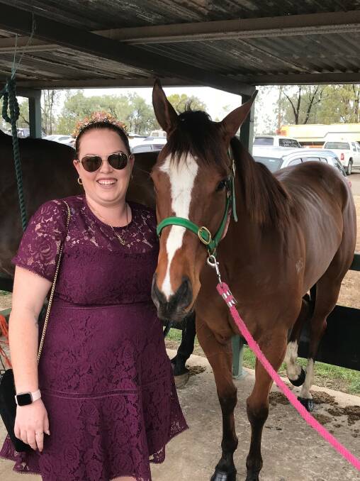 Bianca Bulst, Middlemount, was a happy woman after Only Emma, a filly in which she is a part-owner, won the $15,000 QTIS Plate on Dingo Cup day.