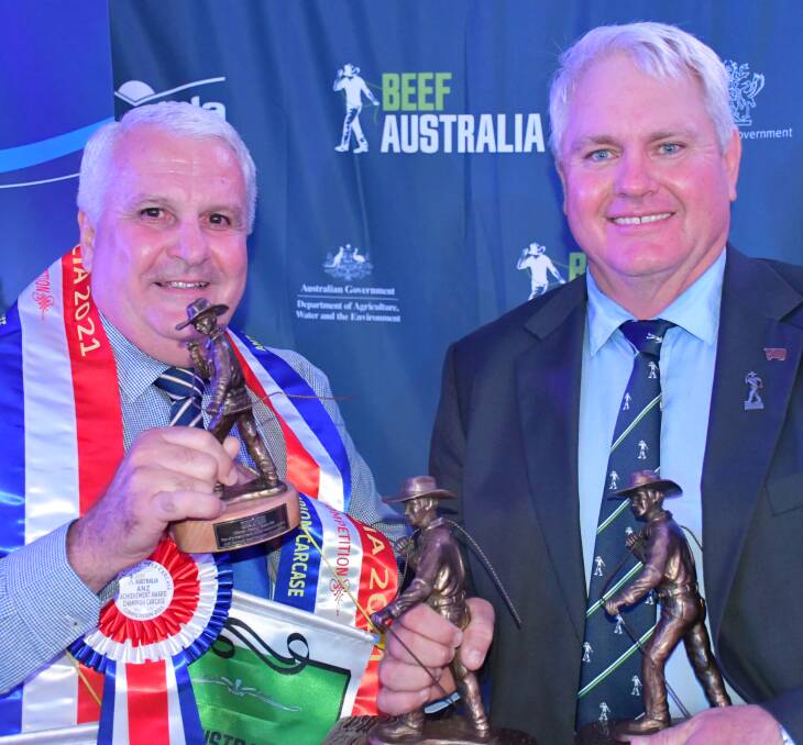 WINNER WINNER: Terry Nolan, Cooloola Blondes, Gympie, congratulated by David Hill after winning big in the ANZ National Beef Carcase Competition.
