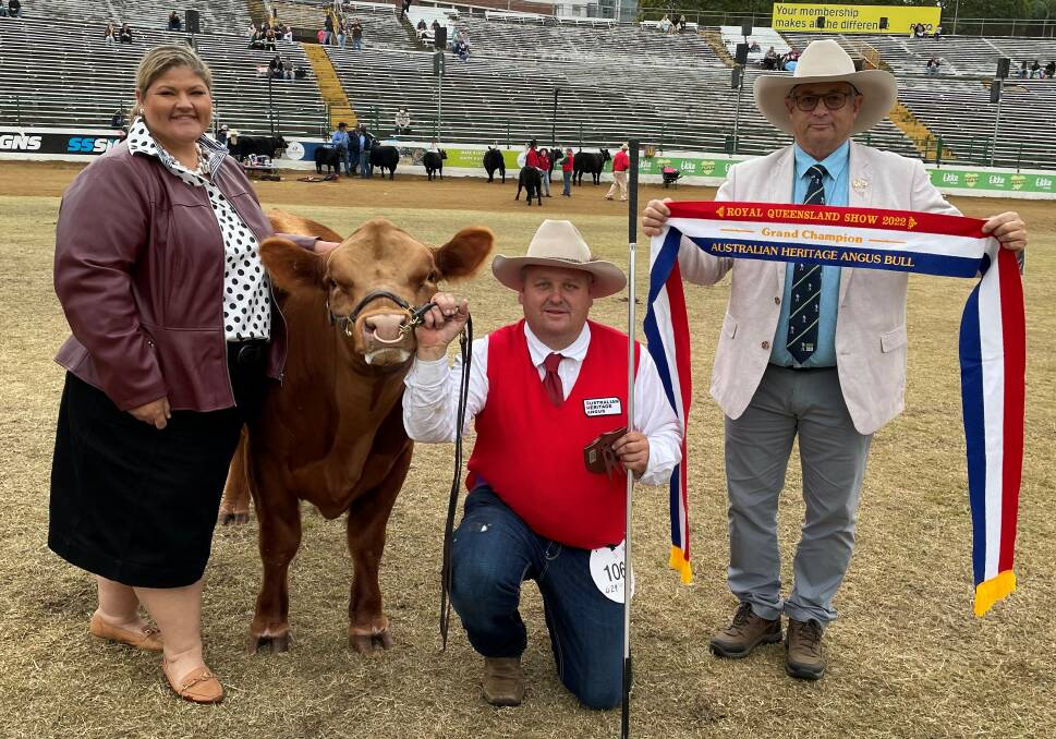 Judge Tammie Robinson, handler, Troy Nuttridge and RNA councillor Gary Noller with champion Australian Heritage Angus bull Mason farm Red Alert. Pictures by Alan Welburn 