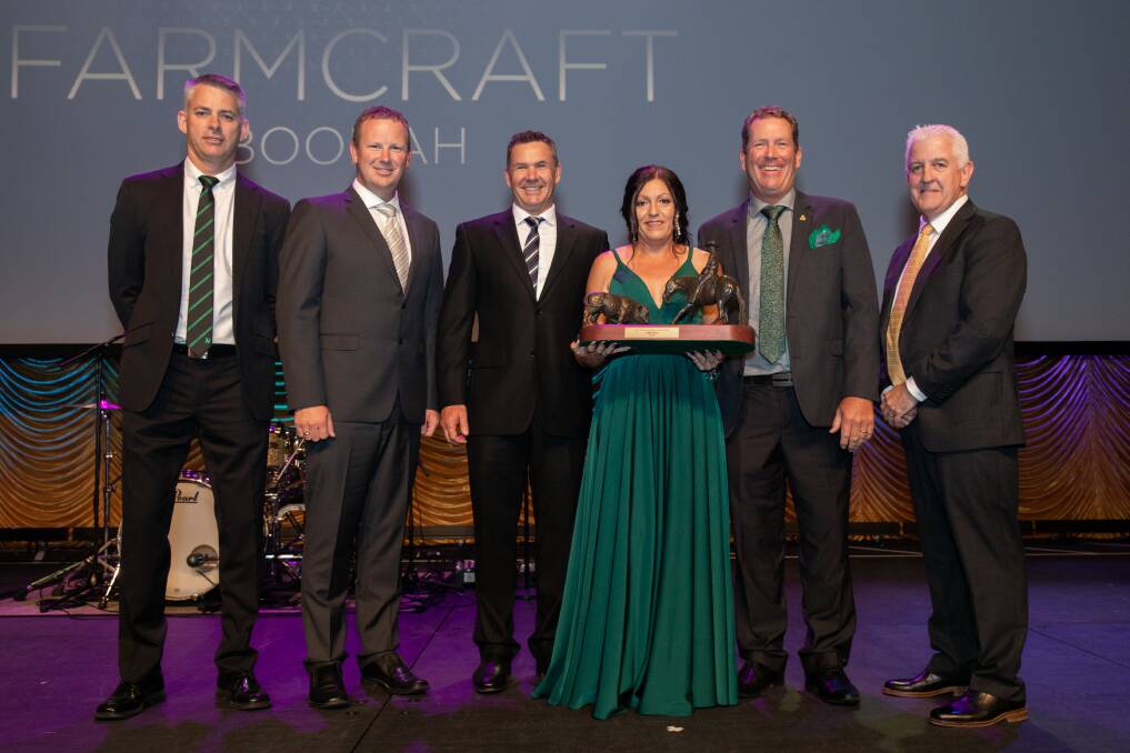WINNING SMILES: Rob Clayton, Chris McPherson, Mick Collings, Joy Ross, Alistair Ross and Greg O'Neil celebrate Farmcraft Boonah being named the 2019 CRT Business Partner of the Year for Queensland.