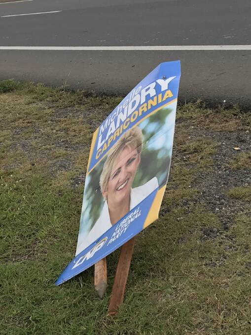 Election signs promoting the LNP's Michelle Landry have been damaged and she thinks the culprit may have links to the ALP.