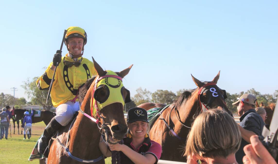 Jockey Les (Bubba) Tilley and Hunter Island return to the winning enclosure after the Emerald 100.