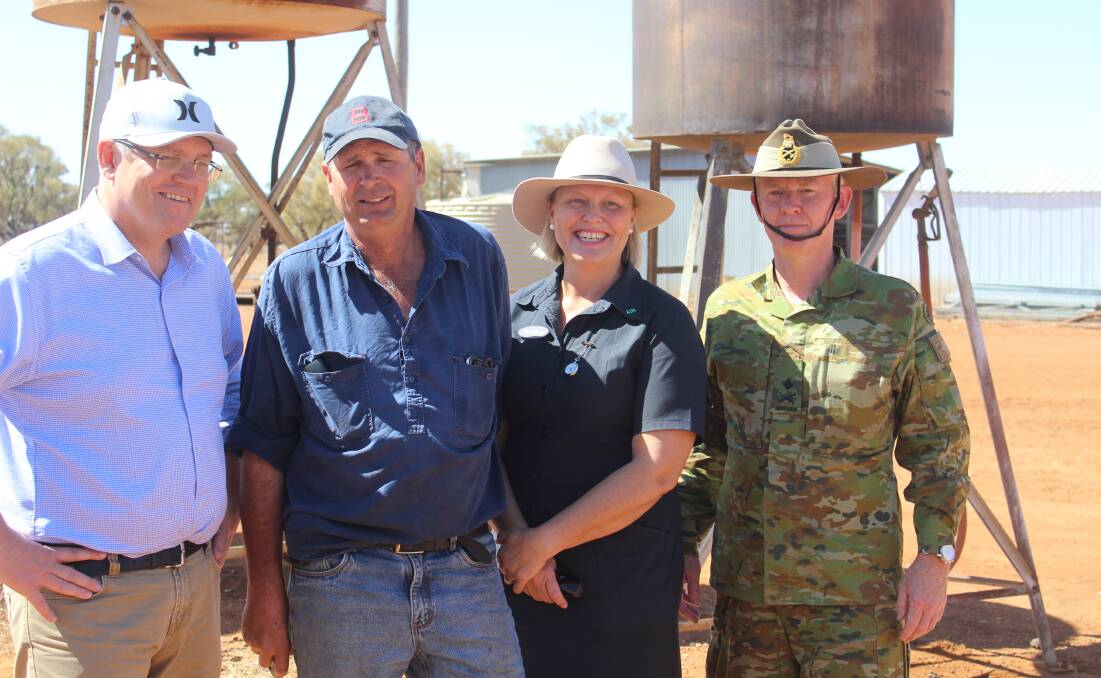 Prime Minister Scott Morrison with Stephen and Annabel Tully and Major General Stephen Day. 