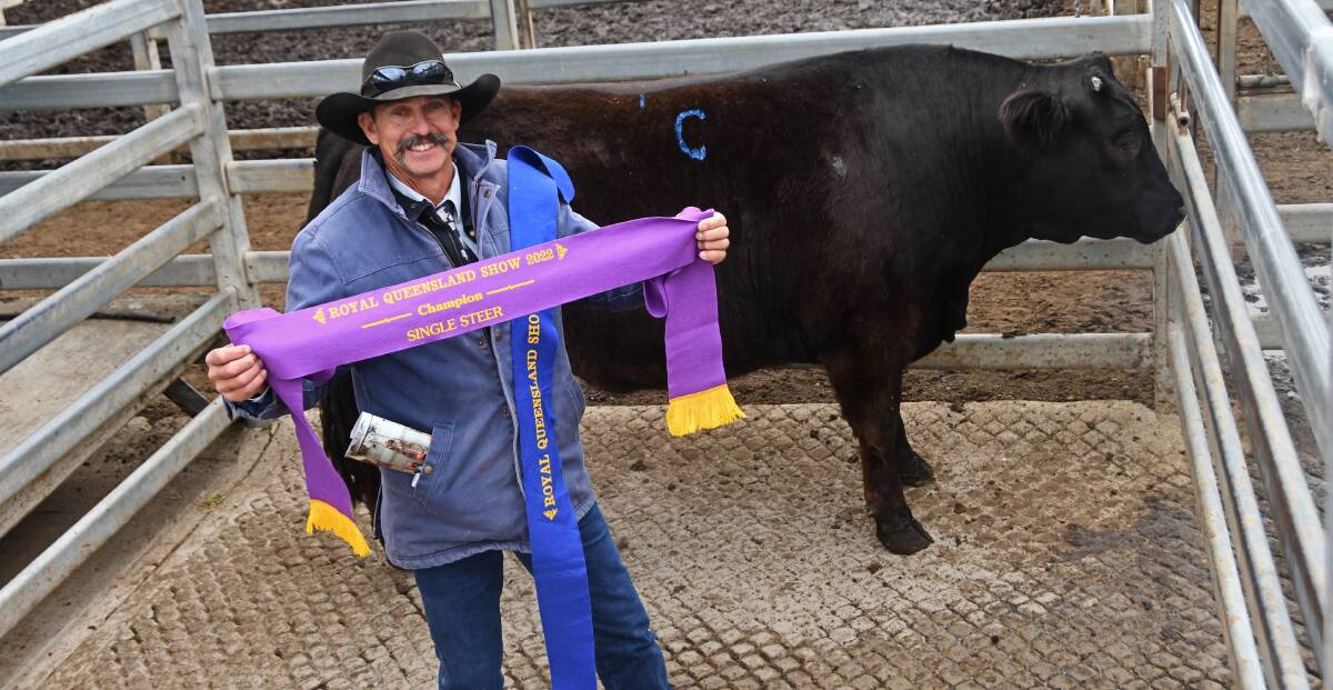 Neil Goetsch, Goetsch and Sons Auctioneers and Reality, Kalbar, with 2022 Ekka prime cattle competition grand champion steer, which was exhibited by his son Bill. Picture: Billy Jupp 