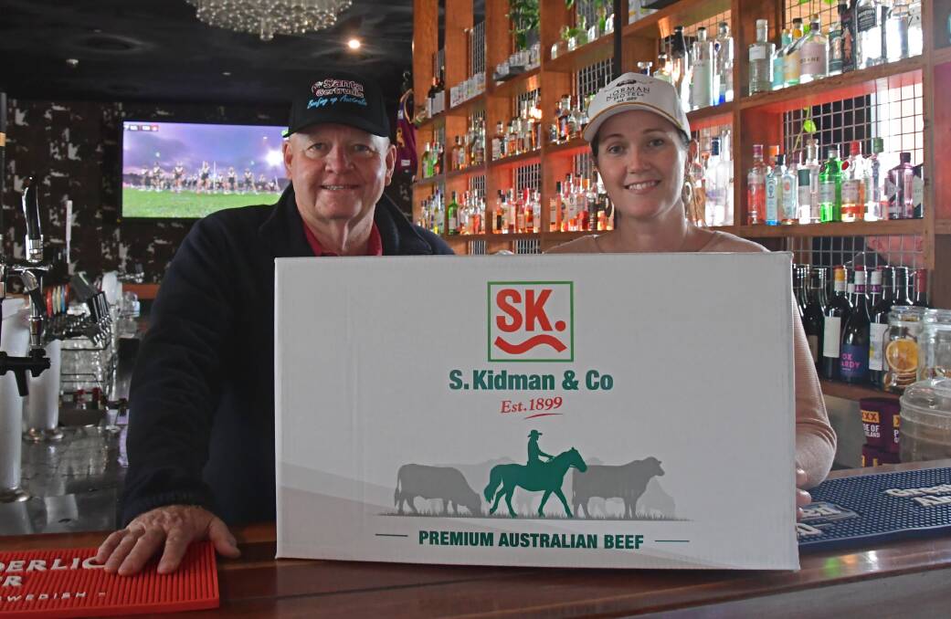 The Norman Hotel's promotions manager Tania Cousens and Santa Gertrudis Breeders Association of Australia general manger Chris Todd are eager to showcase the breed's beef at the venue throughout July. Photo: Billy Jupp 