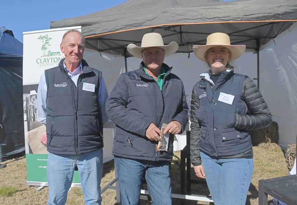 Clayton's Organic Beef livestock co-ordinator Ross Mackenzie, owner Clayton Sargood and marketing manager Anna Kemph exhibited at FarmFest for the first time this year. Photo: Billy Jupp 