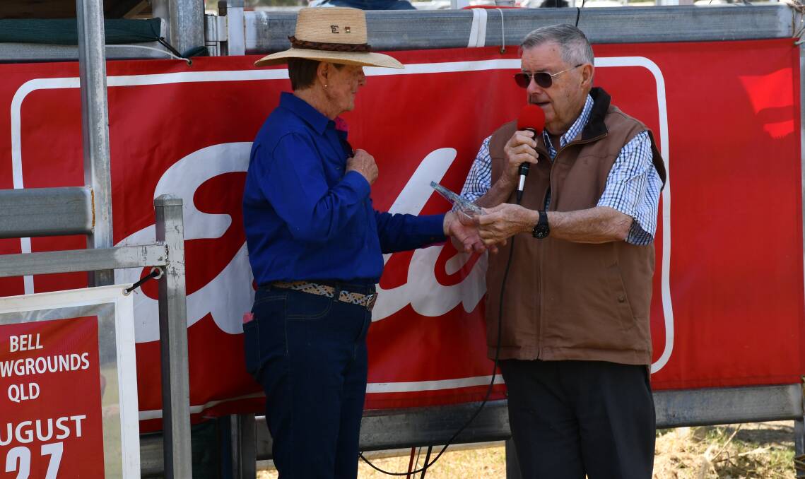 Penny Vohland of the Pen-Leigh Braford stud, Pittsworth, accepts her award for 50 years of breeding Braford cattle. Picture: Billy Jupp 
