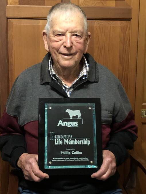 PASSIONATE ABOUT ANGUS: Phil Collins with his honorary life membership from Angus Australia.