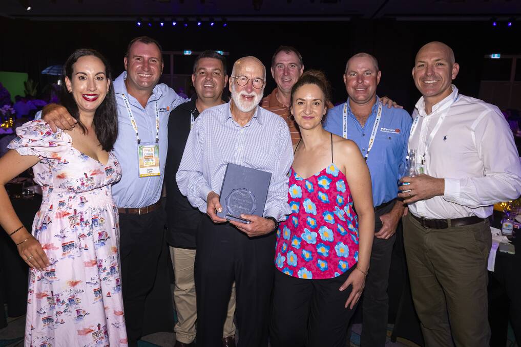 RECEIVED: Citrus Australia Hall of Fame inductee Russell Witcombe (centre with plaque) surrounded by friends and family at the Citrus Australia awards ceremony. 