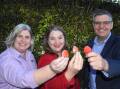 NEW: DAF Qld project lead Dr Jodi Neal, Berries Australia executive Rachel Mackenzie and Hort Innovation chief executive Brett Fifield show off the new Pink strawberry variety.