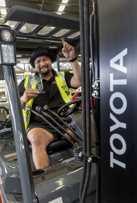 TOPS: Alfred Finau, Costa Farms, with his trophy for winning the Forklift Operator of the Year.