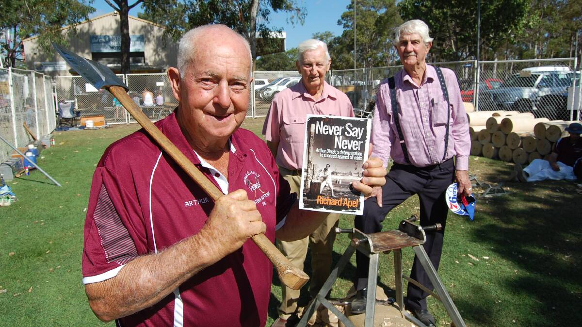 GOOD READ: Mt Perry axeman and businessman, Arthur Dingle, at the launch of his biography, Never Say Never, with good friends John Boydell and author Richard Apel.