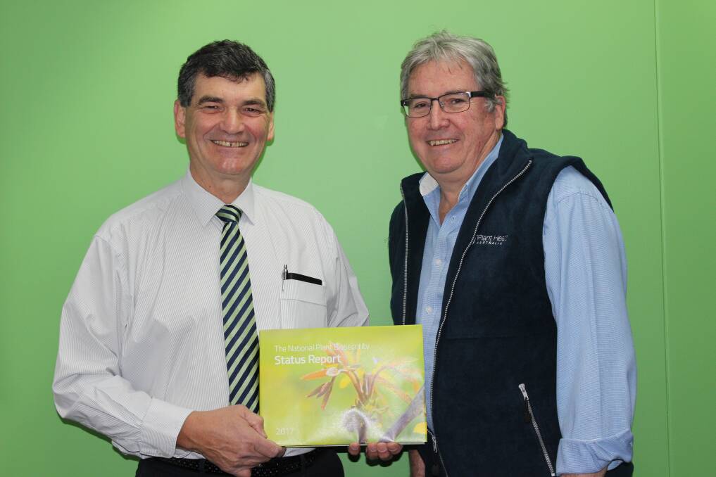 OUT NOW: PHA chair, Steve McCutcheon, with executive director and CEO, Greg Fraser and the tenth National Plant Biosecurity Status Report.