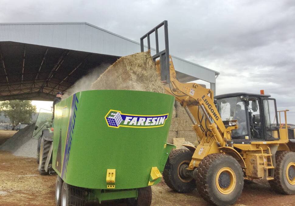 LOAD UP: The Faresin Magnum 2000 has the ability to take and process larger rectangular bales for feed preperation efficiency.  