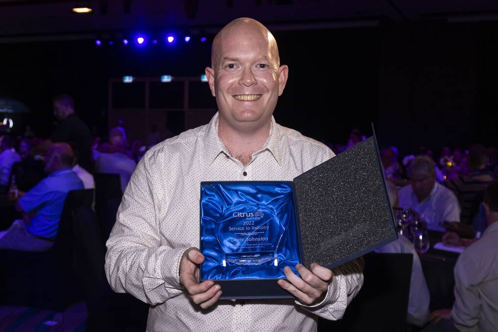 AWARDED: Dr Chris Johnston with his Citrus Australia Service to Industry award. 
