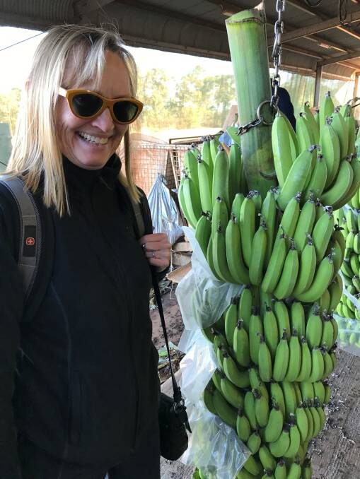 NEW: Bayer Crop Science's director of biologics, Dr Denise Manker, visiting a banana farm during her Australian tour speaking on Bayer's biological products. 
