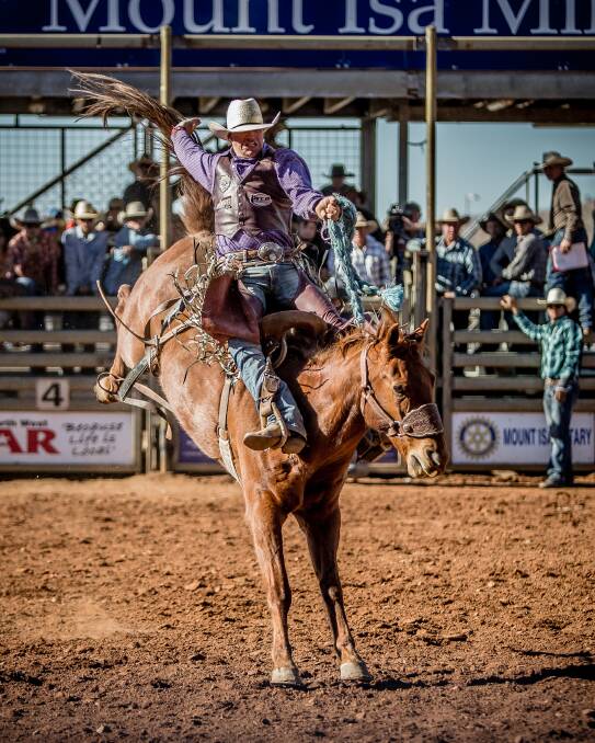 Michael Maher will have tough competition in the saddle bronc at the New Year’s Eve Rodeo in Mitchell. Picture: Stephen Mowbray Photography