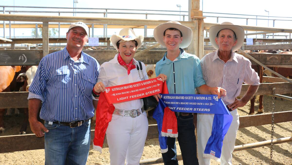 Johnny, Charlie, Donna and Henry Stewart, Wycombe, St George, with their champion pen of Braford heifers at yesterday’s Braford Feature Sale that was held during the Roma Saleyards Store Sale.