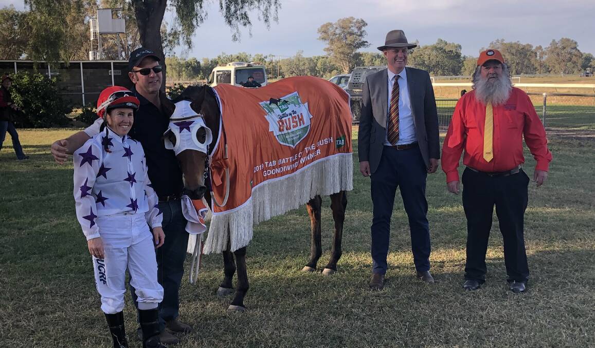 Racing Minister Stirling Hinchliffe (third left) with Goondiwindi Battle of the Bush/Inglewood Cup winner Music Scene along with jockey Leanne McCoy, Dalby trainer Dave Reynolds and race sponsor Jeff Hannaford. 