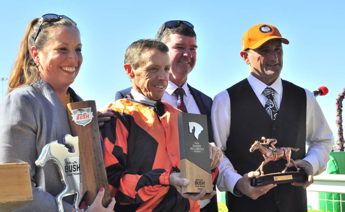 Winning connections of last year's Battle of the Bush winner Hanover Square receive their trophies. This year's Battle of the Bush series will not be held due to horse movement restrictions. Picture: Racing Queensland