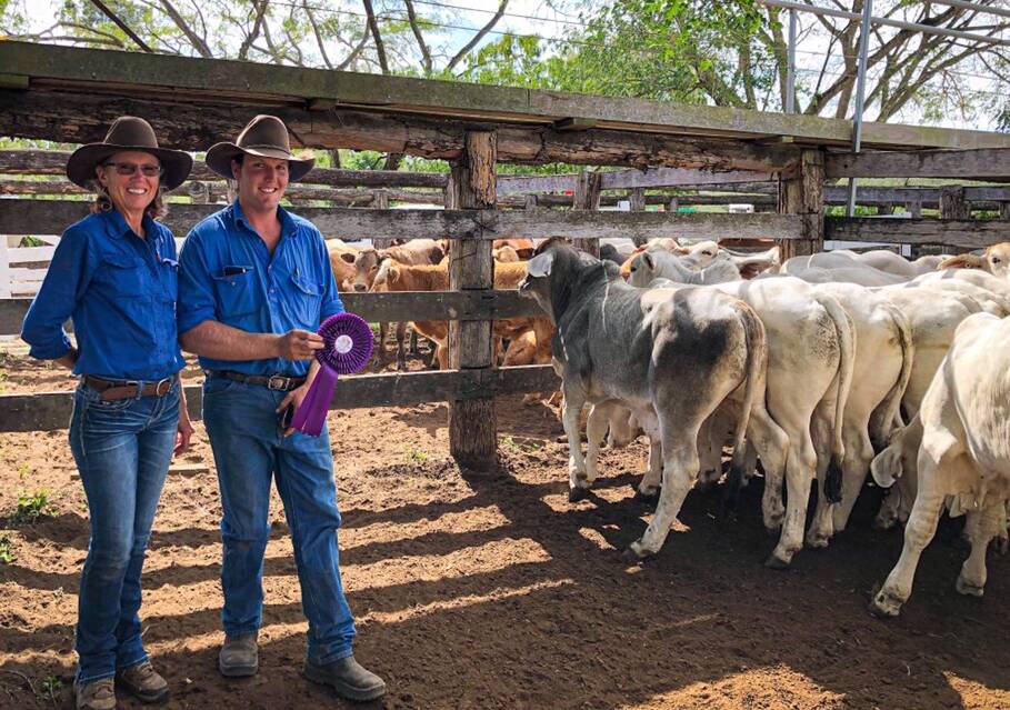 Jenny and Cody Bauer, representing Lynn Bauer with the grand champion pen of 2019 at the annual Gin Gin weaner show and sale.
