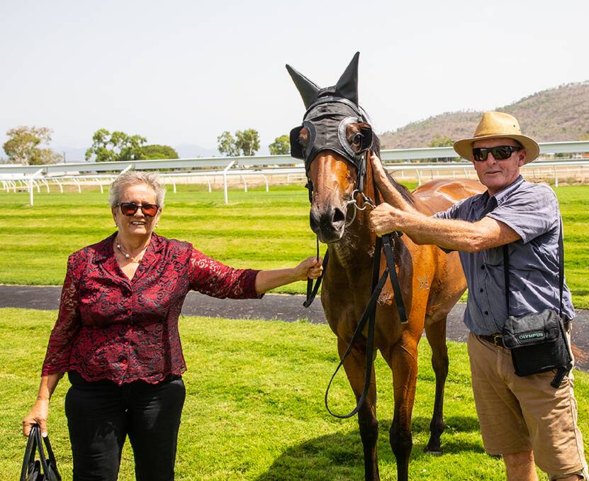 Central Queensland owner Lorraine Mills, Graceville, Mornish, and Rockhampton trainer Peter Fleming with recent Townsville 2YO winner Cat In Raine. The 2YO filly was one of five winners trained by Fleming for Brian and Lorraine Mills during January. Picture: Mike Mills