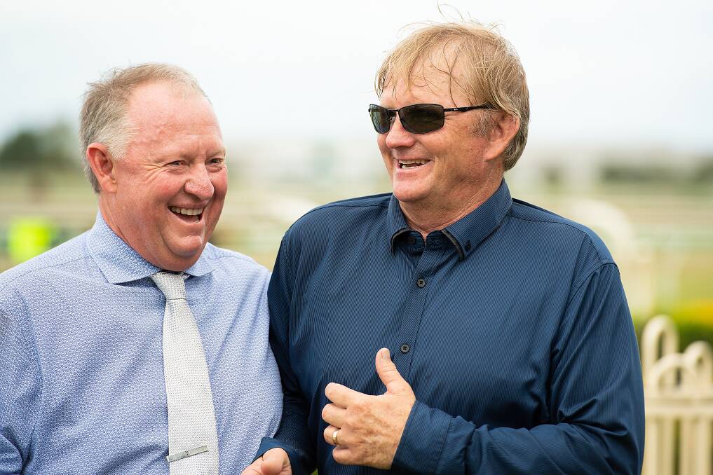 Queensland’s largest pork processor Darren Wilson (left) with his trainer Kelly Schweida secured a couple of yearlings at the Magic Millions.