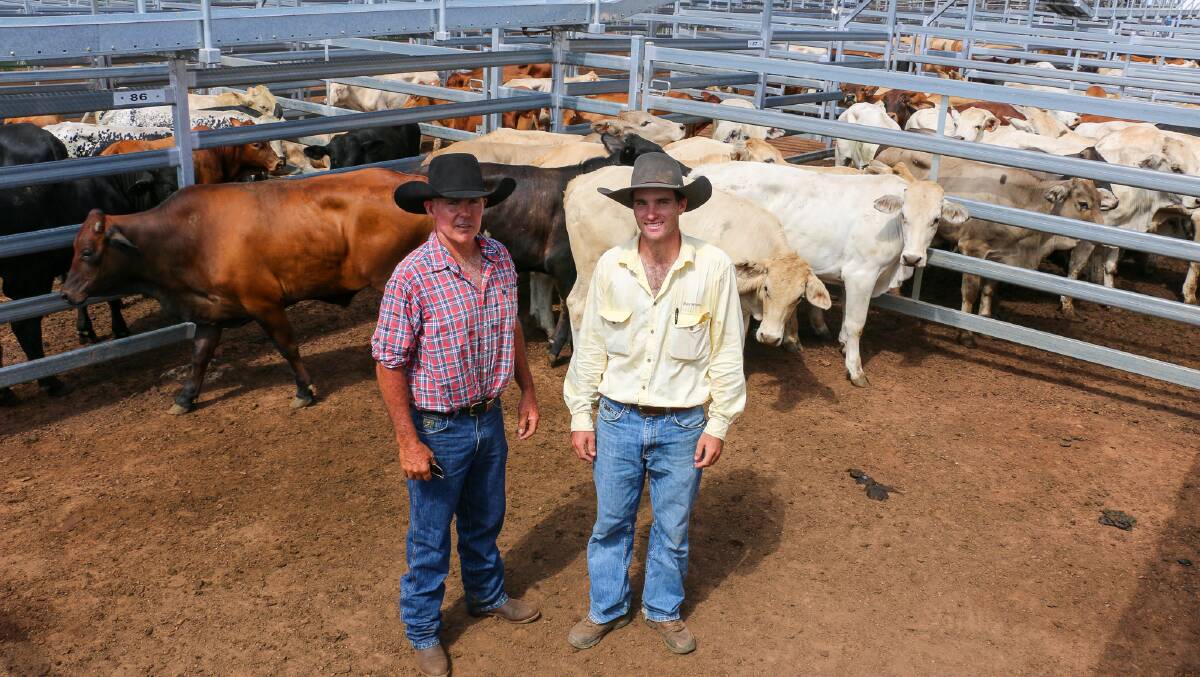 Ray White Roma agent AJ Riley with vendor Peter Brennan. The steers sold to 430c/kg, reaching a top of $1389 to average $1114. The heifers sold to 379c/kg, reaching a top of $1118 to average $879. 