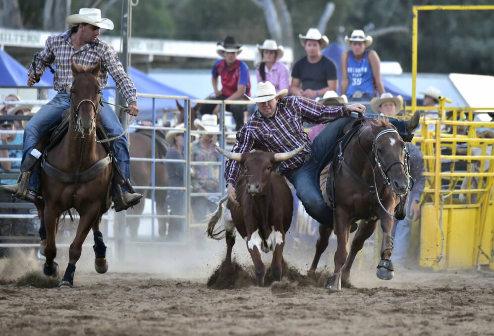 Cameron Bell and Terry Evison in the team roping.