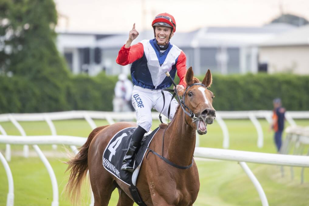 Matthew McGillivray after riding Winning Ways to win the Treasury Brisbane Queensland Oaks at Eagle Farm on Saturday. (AAP Image/Glenn Hunt) 