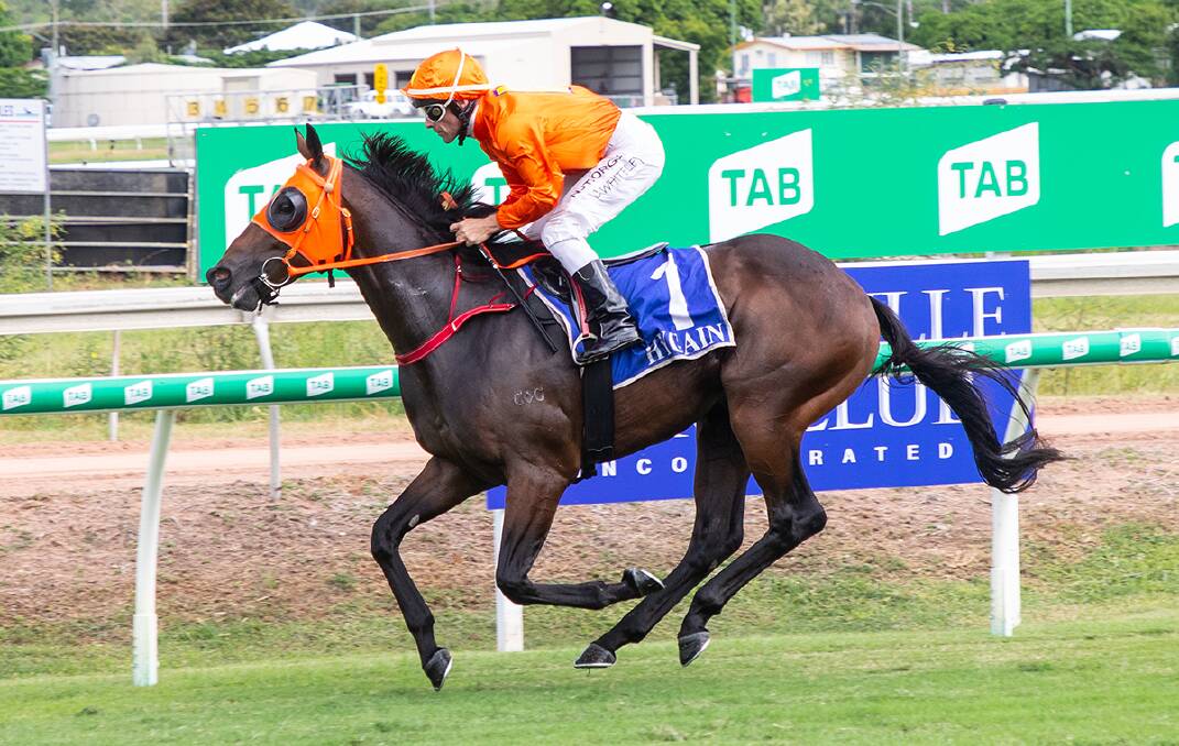 Townsville 2YO winner Endorse ridden by Chris Whiteley scores by eight lengths on his North Queensland debut. Picture: Mike Mills
