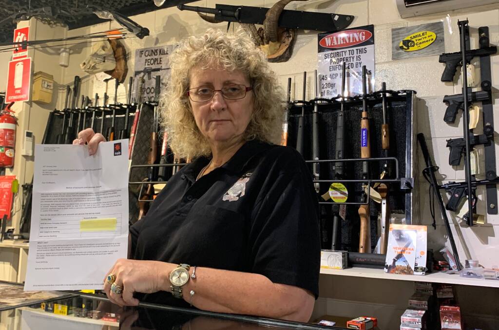 CANCELLED: Smiffy's Guns & Ammo owner Anita Smith with the notification received from NAB.