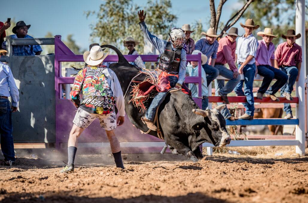 BULL RIDER: Beau Rossow gave his all during the bull-riding event at the Saxby Roundup last weekend. Photos: Jo Thieme Photography