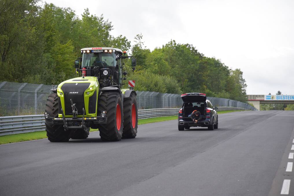 FAST LAP: The Claas Xerion tractor tackles the "north loop" of Germany's famous Nrburgring racetrack in reverse. 
