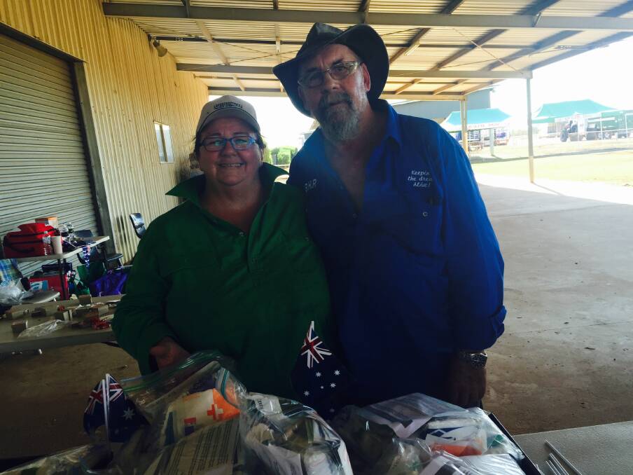 GET OFF YOUR BUMS: Emerald couple Lynn and Calvin are staunch supporters of the Burrumbuttock Hay Runners and this year organised first aid replenishments for drought-stricken farmers.