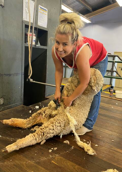 KEEN TO LEARN: Learner shearer Rachel Pritchard at a wool harvesting workshop in Dubbo. 
