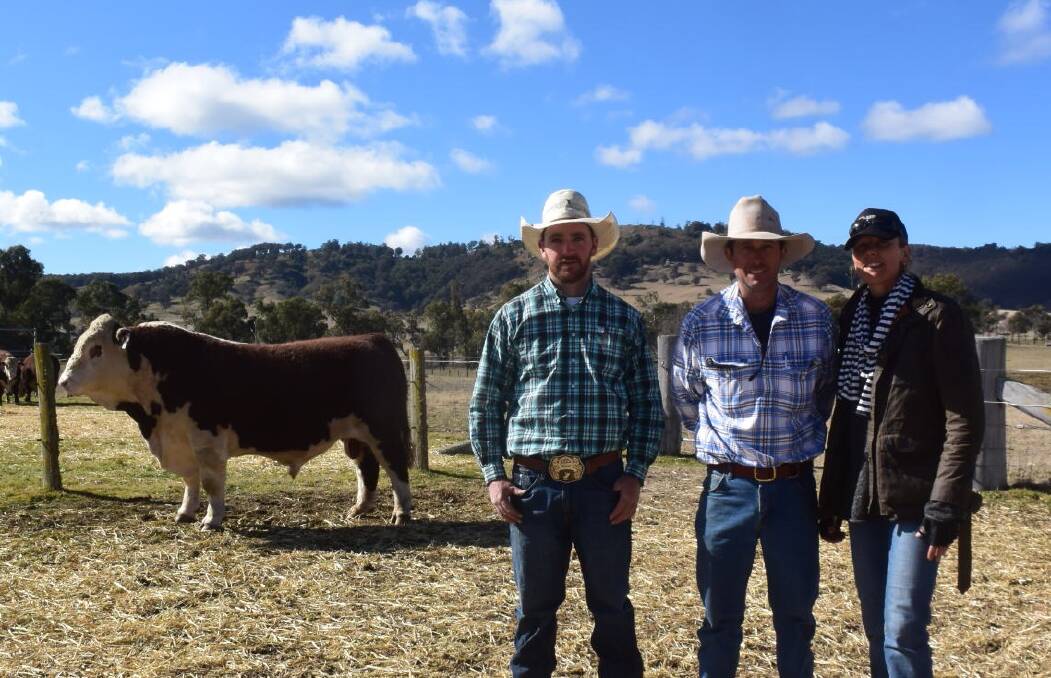 Volume buyers were first time buyers Shaun and Mindy Durdin, Heathwood at Springsure, Qld, who purchased four bulls to an average of $13,500 and a top of $18,000, pictured with Lotus stud principal Ace Hollis.