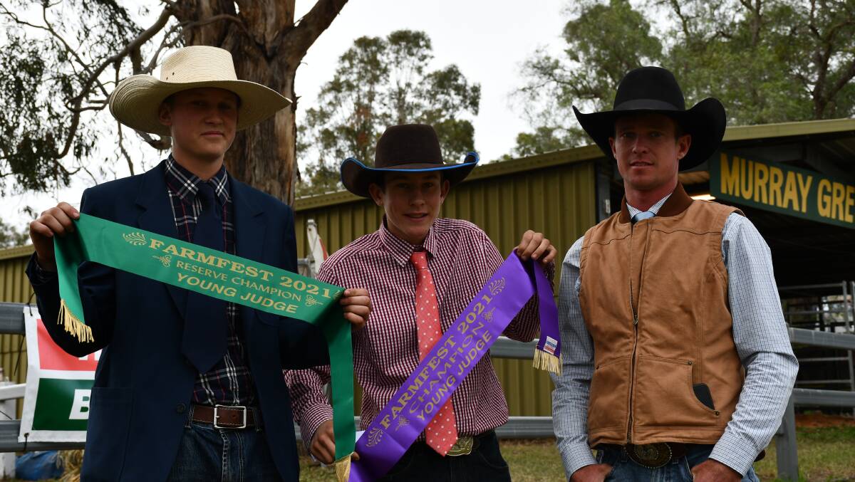 Reserve young judge champion Angus Haynes, Downlands College, young judge champion Marty Worboys, Scots PGC, with over judge William Goetsch. 