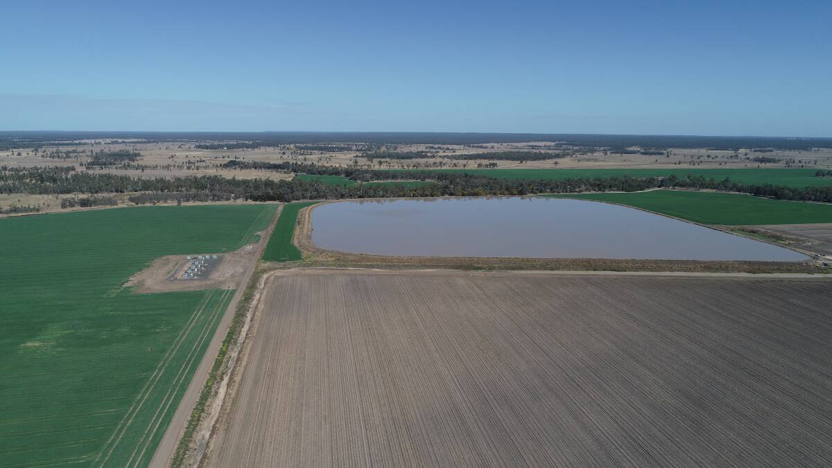 The four well pads sit on the boundary of Zena Ronnfeldt's neighbouring property, she says that Arrow Energy have directionally drilled underneath her 1200-megalitre ring tank. Supplied: Zena Ronnfeldt