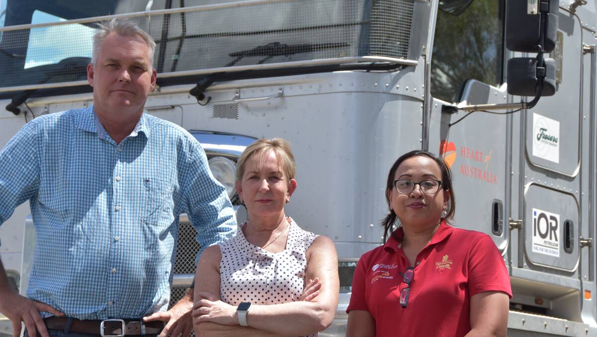 Lachie Millar (left) and Ros Bates (middle) met with Mario Abrigo from the Heart of Australia bus in Barcaldine. 